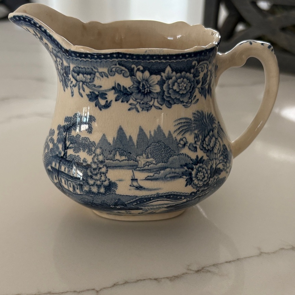 Elegant Blue and Cream Ceramic Pitcher